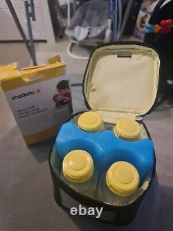 Maxi. Double electric breast pump and cooler bag and some breast milk storage