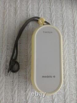 Medela Freestyle Flex Double Electric Breast Pump & Medela hands free Bra size L