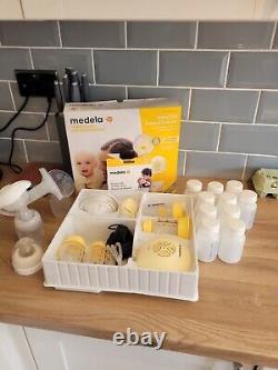 Medela Swing Electric Single Breast Pump and accessories