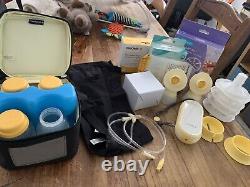 Medela freestyle flex breast pump with extras