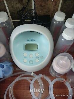 Spectra S1 plus. Double breast pump + loads of extras + Bottle warmer, nappies